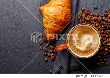 Cappuccino coffee and fresh croissant 113736380