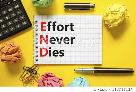 END effort never dies symbol. Concept words END effort never dies on beautiful white note. Beautiful yellow background. Black calculator. Business END effort never dies concept. Copy space. 113737134