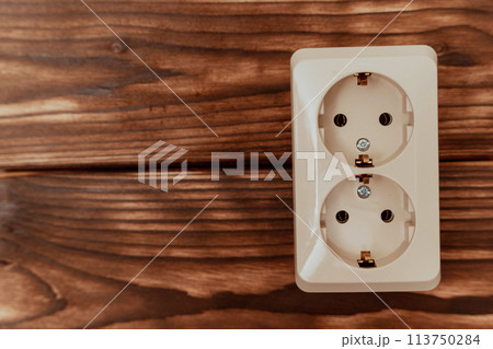 Electrical Outlet on Wooden Wall Electrical Outlet on Wooden Wall 113750284