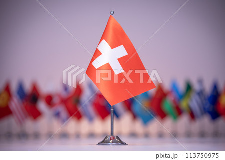 Switzerland flag with a gray and clean background. Switzerland flag with a gray and clean background. 113750975