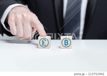 Wooden blocks with currency icons 113752942