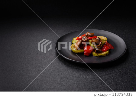 Delicious fresh grilled vegetables zucchini, bell peppers, mushrooms and onions 113754335