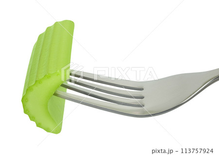 fresh celery on a fork isolated on white background with full depth of field 113757924