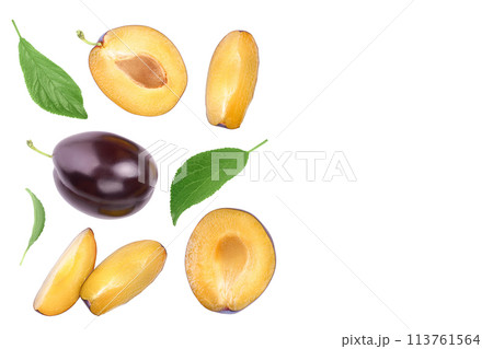 fresh purple plum and half isolated on white background with copy spase for your text. Top view. Flat lay fresh purple plum and half isolated on white background with copy spase for your text. Top view. Flat lay 113761564
