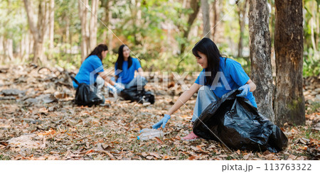 Group of volunteers, community members cleaning the nature from garbage and plastic waste to send it for recycling Group of volunteers, community members cleaning the nature from garbage and plastic waste to send it for recycling 113763322