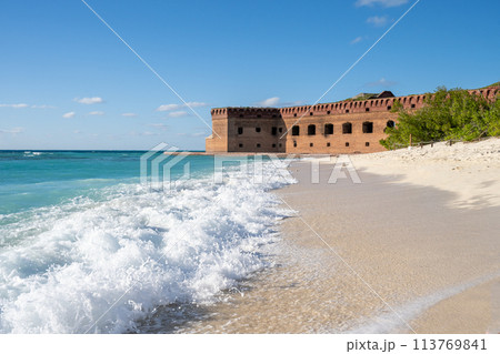 Waves and beach surf outside Fort Jefferson on Dry Tortugas National Park. Waves and beach surf outside Fort Jefferson on Dry Tortugas National Park. 113769841
