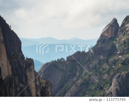 Deep canyon with sharp rocks. 113775795
