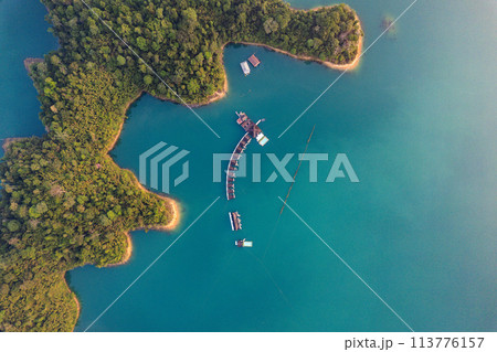 Floating bungalow on the Cheow lan Lake in Khao Sok National Park in Surat Thani, Thailand Floating bungalow on the Cheow lan Lake in Khao Sok National Park in Surat Thani, Thailand 113776157