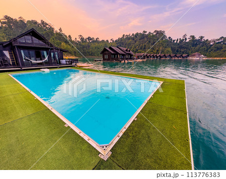 Floating bungalow on the Cheow lan Lake in Khao Sok National Park in Surat Thani, Thailand 113776383