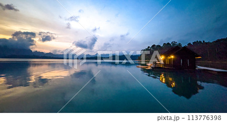 Floating bungalow on the Cheow lan Lake in Khao Sok National Park in Surat Thani, Thailand Floating bungalow on the Cheow lan Lake in Khao Sok National Park in Surat Thani, Thailand 113776398