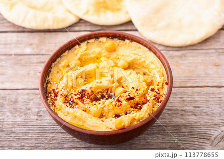 Declicious food from chickpea - hummus . Declicious food from chickpea - hummus . 113778655