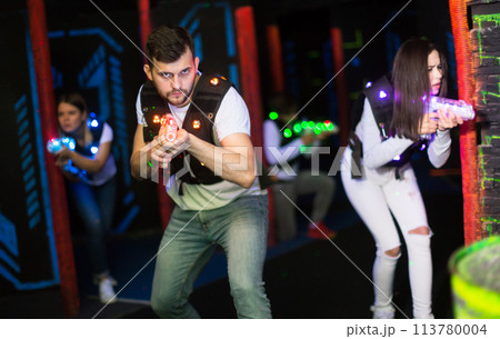 Emotional guy playing laser tag Emotional guy playing laser tag 113780004