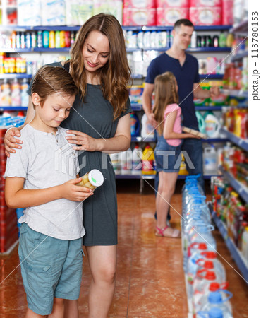 Mother and son choosing meal 113780153