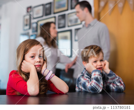 Parents having bad row while their children at home 113780181