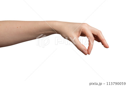 Caucasian female s hand gesture. Pinch, hold, sprinkle action showing salt or spice. Tiny fingers 113790059