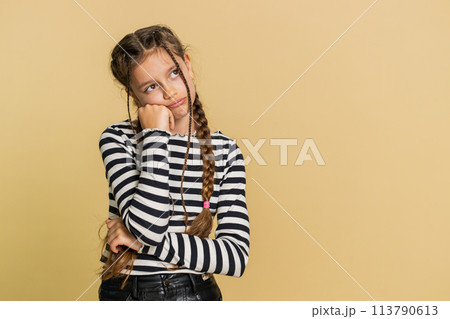 Child girl tired bored expression exhausted of tedious story not interested in communication talk Child girl tired bored expression exhausted of tedious story not interested in communication talk 113790613