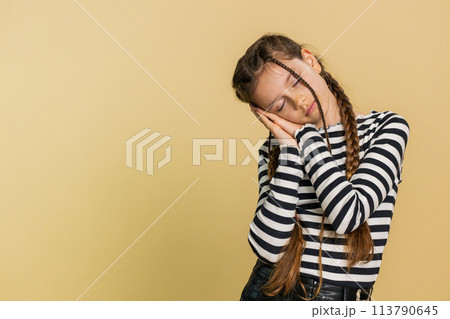 Tired exhausted child girl lazy bored of education lack of sleep falling asleep taking a break relax Tired exhausted child girl lazy bored of education lack of sleep falling asleep taking a break relax 113790645