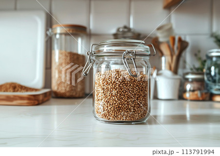 Buckwheat stored in a glass jar 113791994