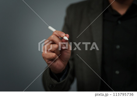 businessman hand using digital pen writing on empty virtual screen businessman hand using digital pen writing on empty virtual screen 113795736