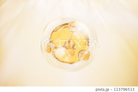 Molecule and golden liquid bubble, 3d rendering. 113796513