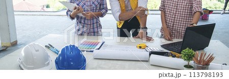 Banner asian engineer man brainstorming teams partner meeting office desk on construction site. Architecture civil Engineer contractor manager team meeting together. Teamwork business with copy space 113798193