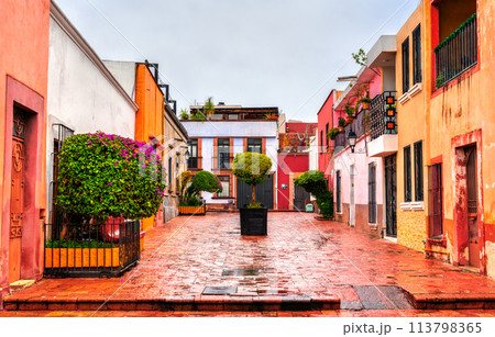 Traditional colorful houses in Santiago de Queretaro, Mexico in rainy weather 113798365