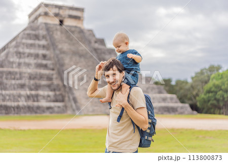 Father and son tourists observing the old pyramid and temple of the castle of the Mayan architecture known as Chichen Itza these are the ruins of this ancient pre-columbian civilization and part of 113800873