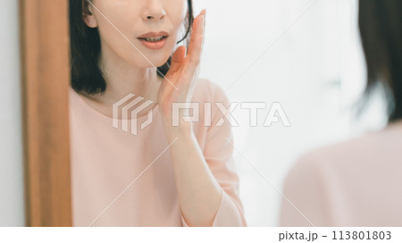 a forty-something woman a forty-something woman 113801803