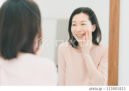 a forty-something woman a forty-something woman 113801811