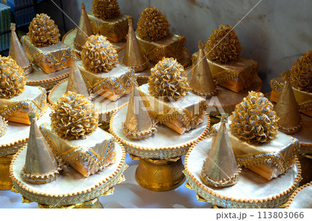 Buddha statue offerings Inside a Buddhist temple in Thailand. 113803066