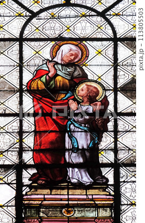 Saint Anne with Virgin Mary, stained glass window in the Basilica of Notre Dame des Victoires in Paris, France Saint Anne with Virgin Mary, stained glass window in the Basilica of Notre Dame des Victoires in Paris, France 113805503
