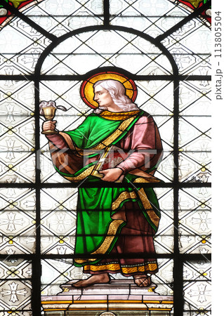 Saint John the Evangelist, stained glass window in the Basilica of Notre Dame des Victoires in Paris, France Saint John the Evangelist, stained glass window in the Basilica of Notre Dame des Victoires in Paris, France 113805504
