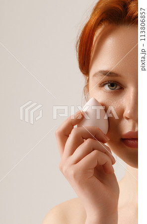 Beautiful girl with red hair and freckles Beautiful girl with red hair and freckles 113806857