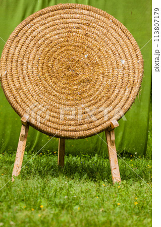 Old fashioned shooting target made of hay 113807179
