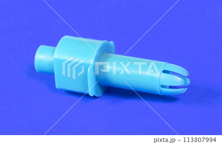 Old confectionery syringe isolated on solid background Old confectionery syringe isolated on solid background 113807994