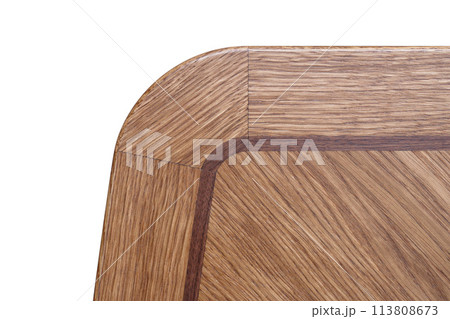Closeup of wooden table top made of solid oak and veneer of marquetry technique on white background 113808673