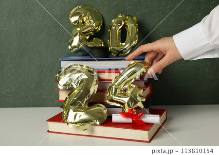 Graduate attributes and inflatable balloons in the shape of numbers 2024. Graduate attributes and inflatable balloons in the shape of numbers 2024. 113810154