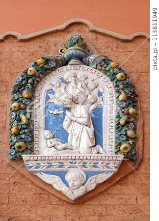 Nativity scene on the house facade in Bologna, Italy 113811949