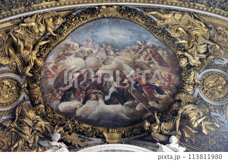Triumph of the Just,  fresco by Giancito Brandi, surrounded by lush gilded stucco ornament in church Gesu e Maria in Rome, Italy 113811980