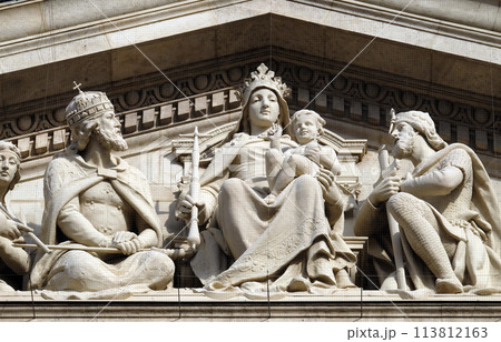 Tympanum bass relief showing the Virgin Mary and Hungarian saints, St. Stephen`s Basilica in Budapest, Hungary. 113812163