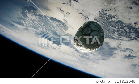 old soccer ball in space on Earth orbit 113812949