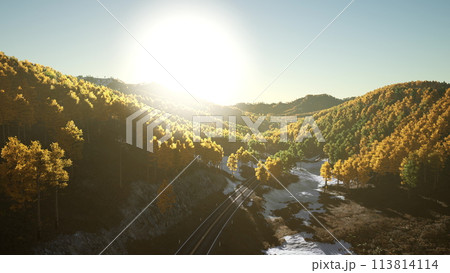 An aerial view of a road in the mountains. beautiful sunset 113814114