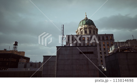 A tall building with a dome on top of it 113814698