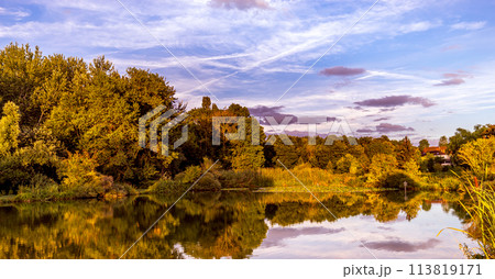 Sunset on a pond in Santeny, france 113819171