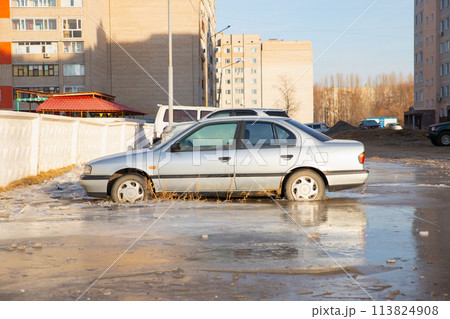 old Nissan Primera car in frozen water. winter accident. Pavlodar, Kazakhstan - 12.28.2022. old Nissan Primera car in frozen water. winter accident. Pavlodar, Kazakhstan - 12.28.2022. 113824908