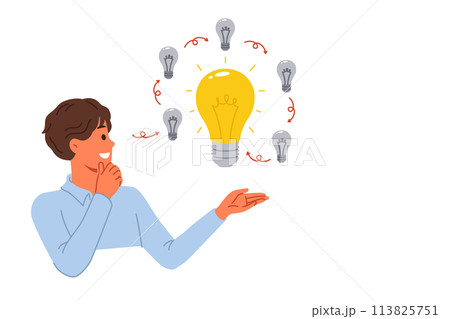 Man comes up with innovative idea, allows to get investments, standing near light bulbs 113825751