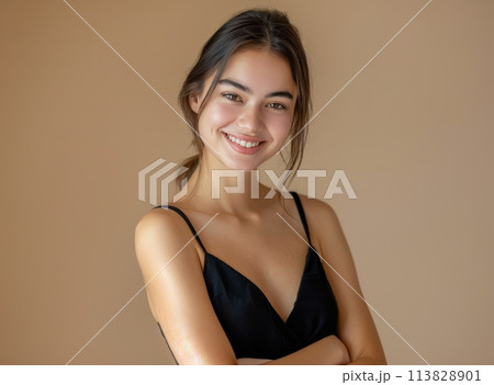 Woman in Black Dress Posing for Picture 113828901