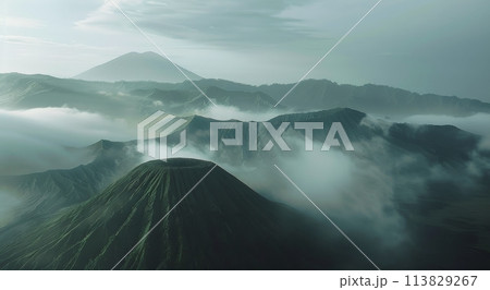 Mountain Shrouded in Fog Near Ocean 113829267