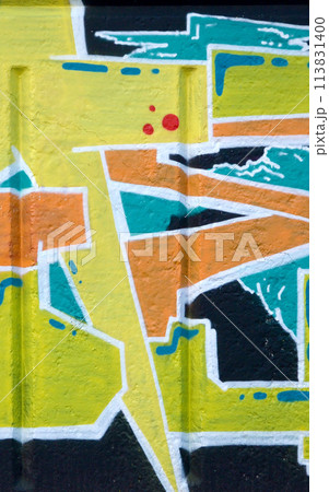Colorful background of graffiti painting artwork with bright aerosol outlines on wall. Old school street art piece made with aerosol spray paint cans. Contemporary youth culture backdrop Colorful background of graffiti painting artwork with bright aerosol outlines on wall. Old school street art piece made with aerosol spray paint cans. Contemporary youth culture backdrop 113831400