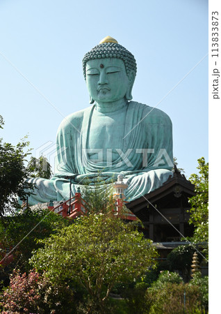 Outdoor great Buddha Daibutsu or Amitabhe Buddha at Wat Pra That Doi Pra Chan. It is a green rust Buddha statue made from a mixture of copper that was used to create it. Outdoor great Buddha Daibutsu or Amitabhe Buddha at Wat Pra That Doi Pra Chan. It is a green rust Buddha statue made from a mixture of copper that was used to create it. 113833873